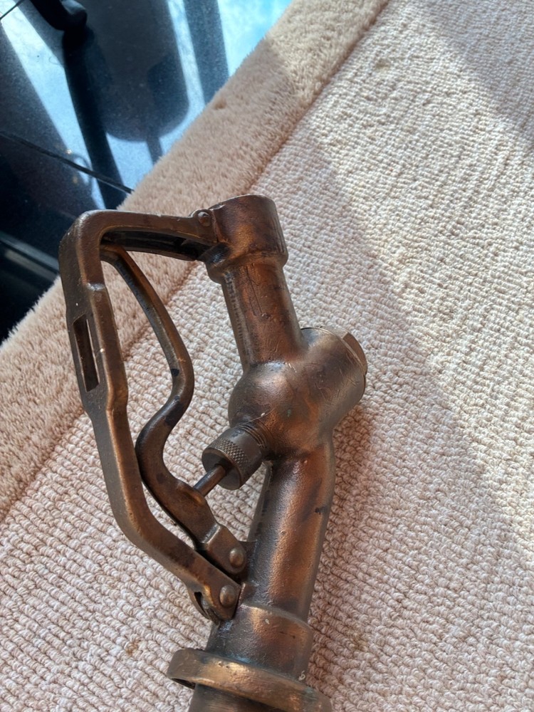 vintage gas pump nozzle brass