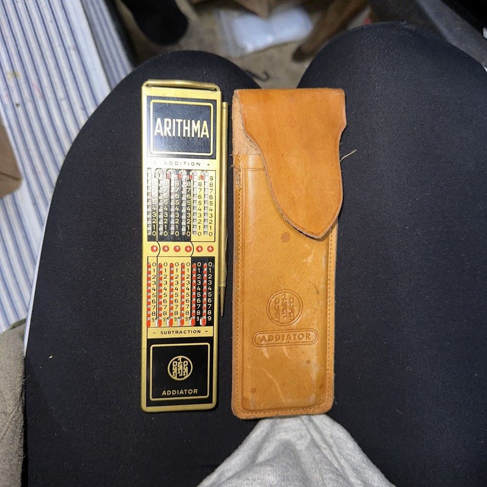 Addiator worlds smallest precision adding machine