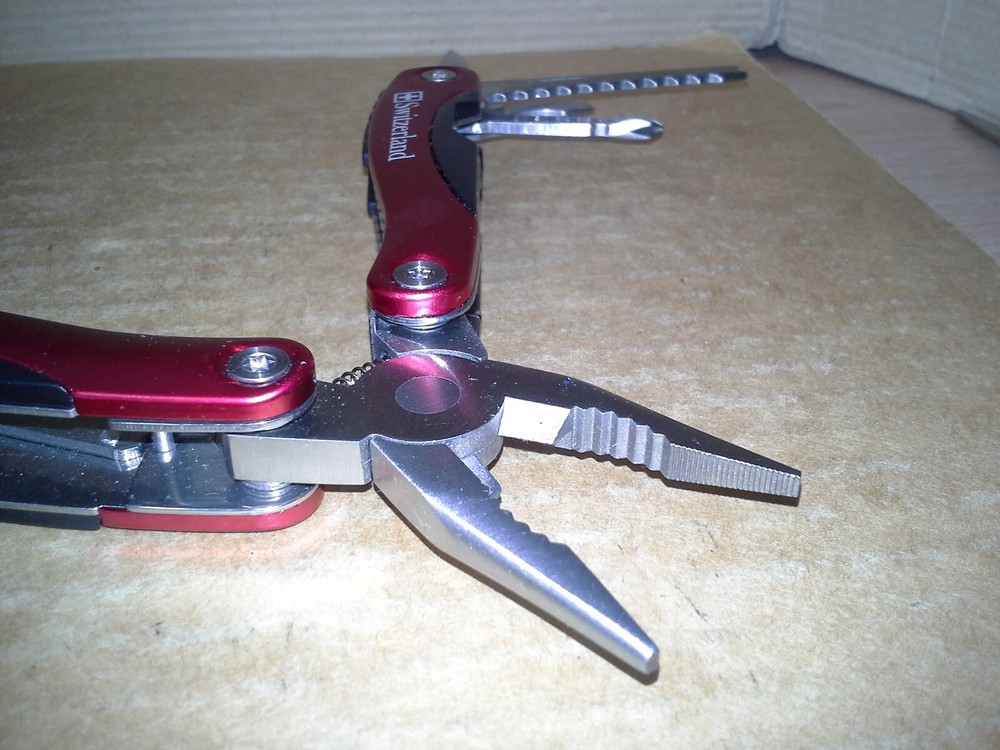 Switzerland Red Multitool Folding Pocket Pliers. VGC