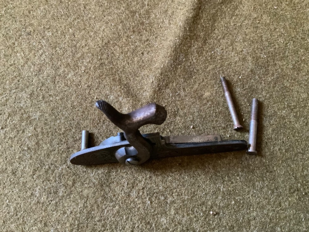 Percussion lock with screws