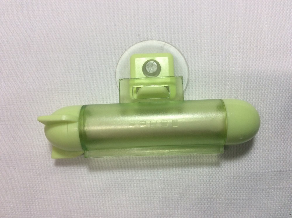 Toothpaste Squeezer with Space Saving Suction Hanger
