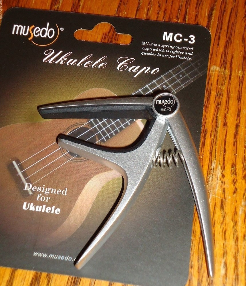 UKE UKULELE TRIGGER CAPO COMFORTABLE QUICK RELEASE ADJUST SPRING STAGE OR STUDIO