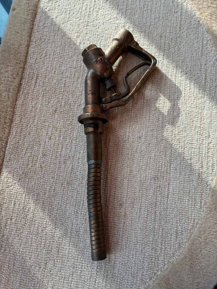 vintage gas pump nozzle brass