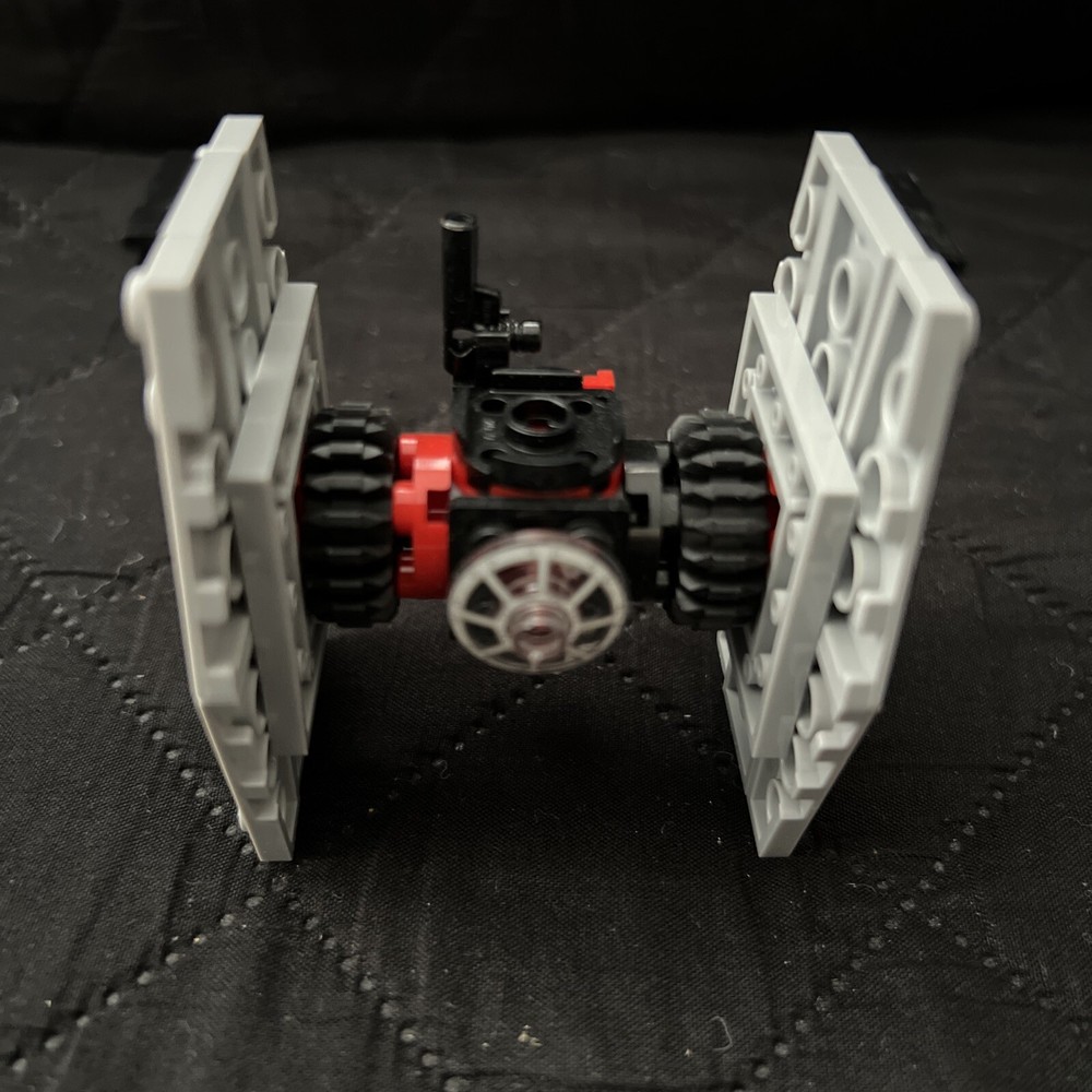 star wars tiny lego tie fighters and Madalorian ship
