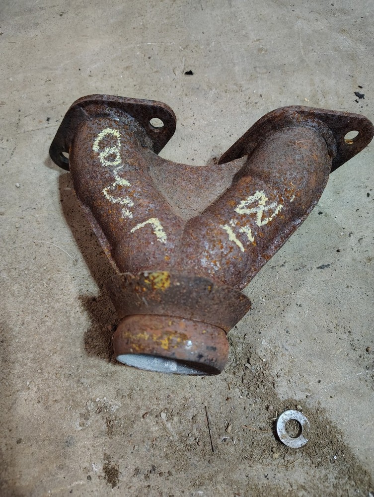 1989 Arctic cougar exhaust manifold