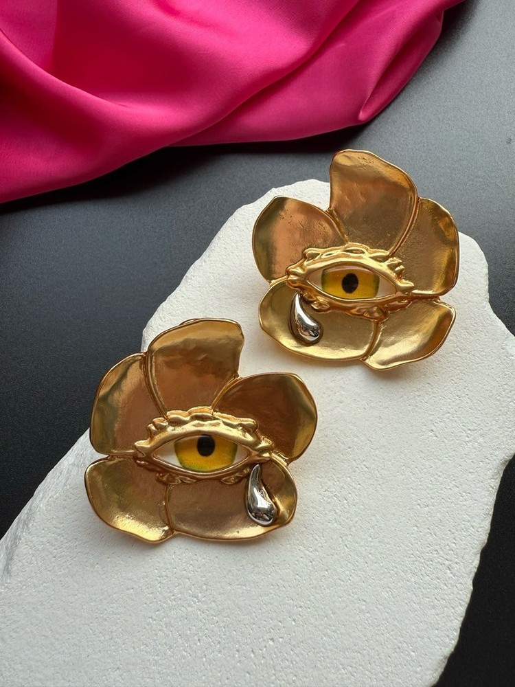 Schiaparelli flower yellow eye earring
