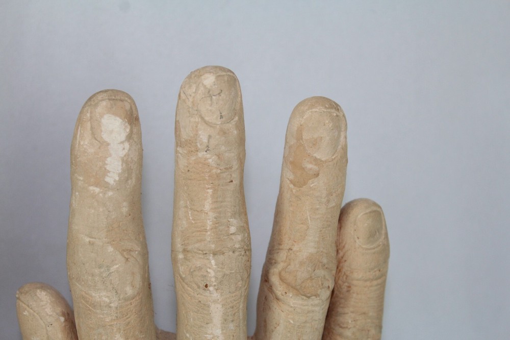 Plaster bookends Reading Hands