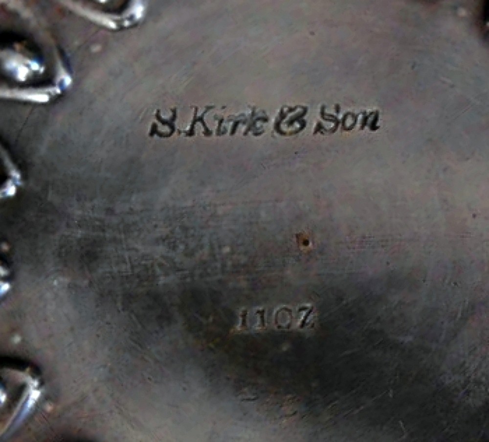 A rare repousse solid silver chamberstick, 11oz mark, S.Kirk & Son c.1886-96