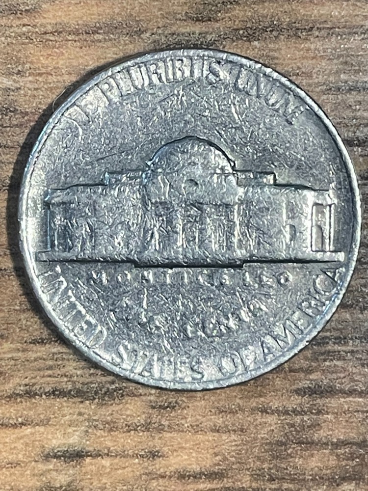 1970 S Jefferson Nickel Errors with Letters on back touching Rim.