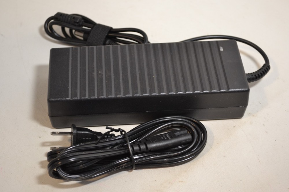 AC/DC Adapter Model: BYM-128