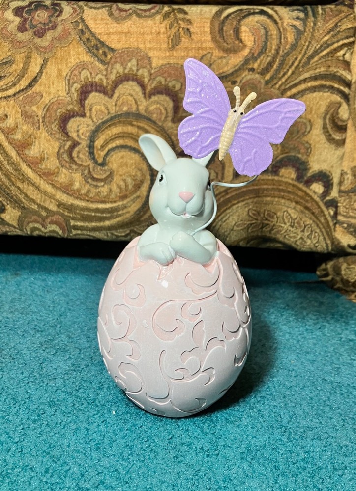 porcelain Bunny in Easter Egg holding butterfly