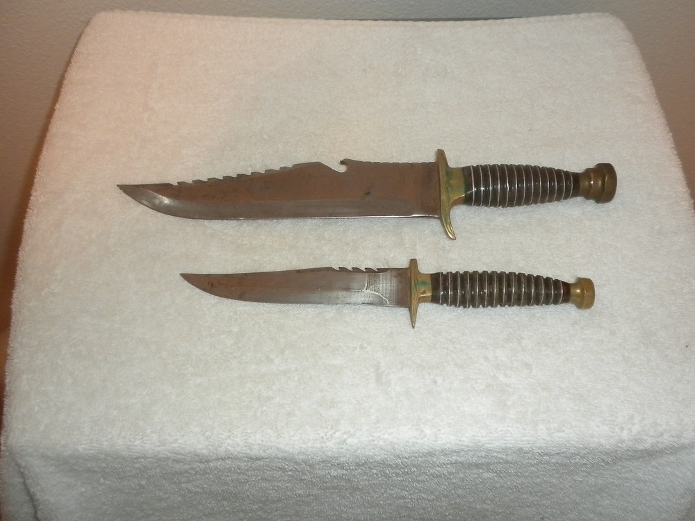 TWO KNIVES SAME DESIGN WITH LEATHER HOLDER