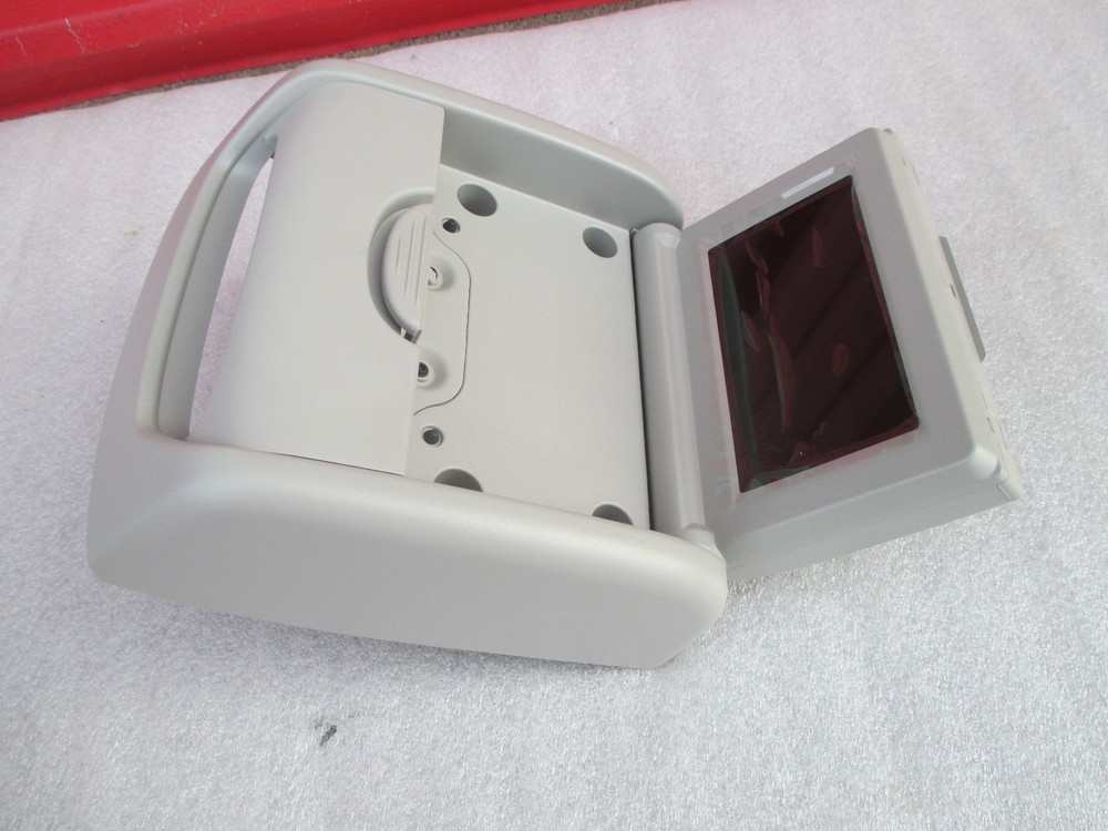 Chrysler. MOPAR 05135243AA: BEZEL, HOUSING. DVD Console OEM
