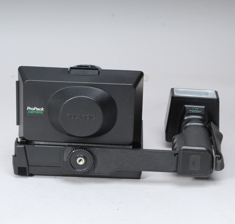 POLAROID PRO-PACK IN THE BOX W CAMERA FLASH STRAP & MANUALS FLASH BAD