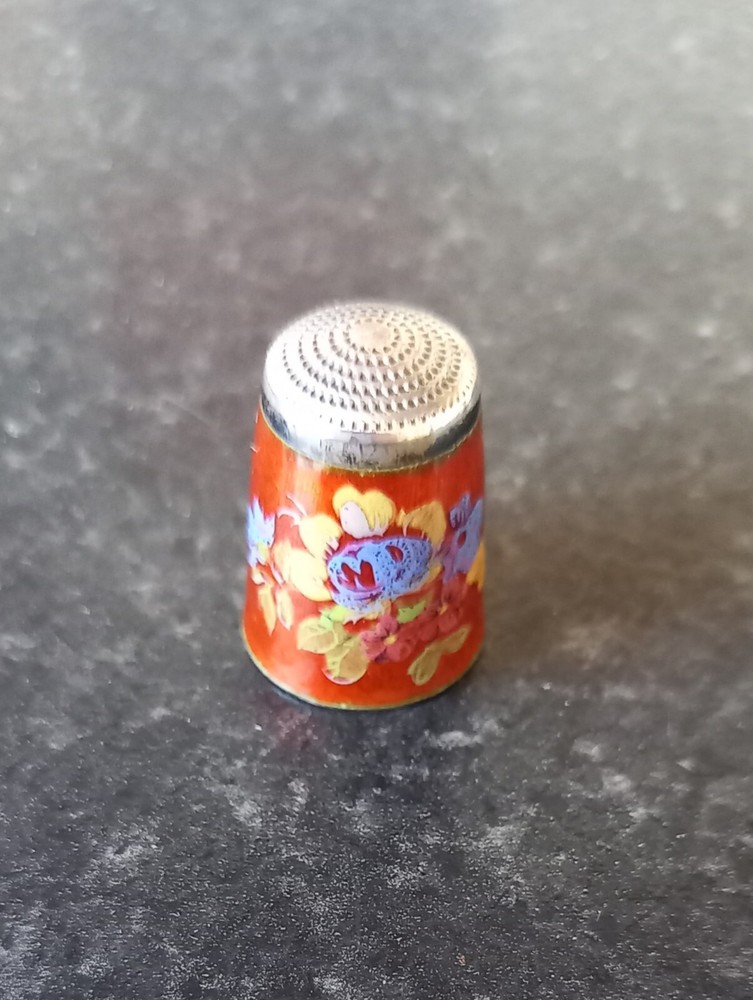 ANTIQUE STERLING SILVER AND ORANGE FLORAL ENAMEL THIMBLE