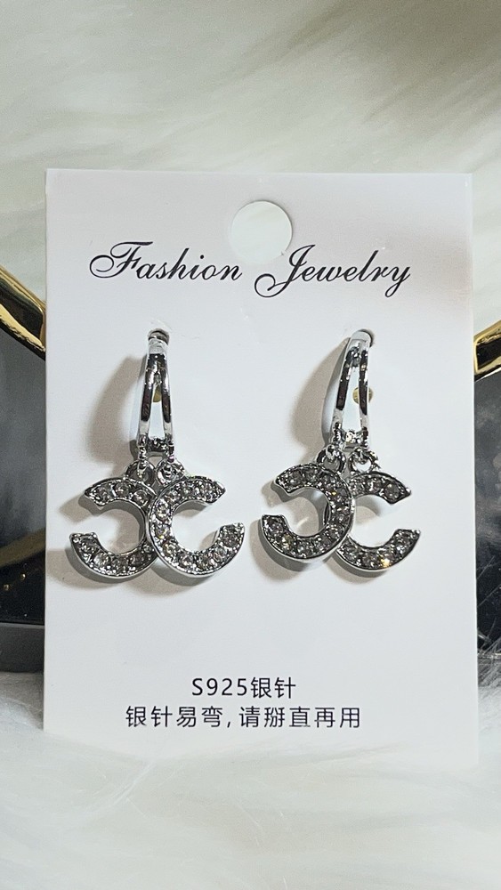 LUXURY STERLING SILVER EARRINGS .