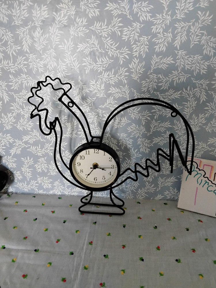 Black Metal Rooster-Shape Frame With Circular Clock Face .