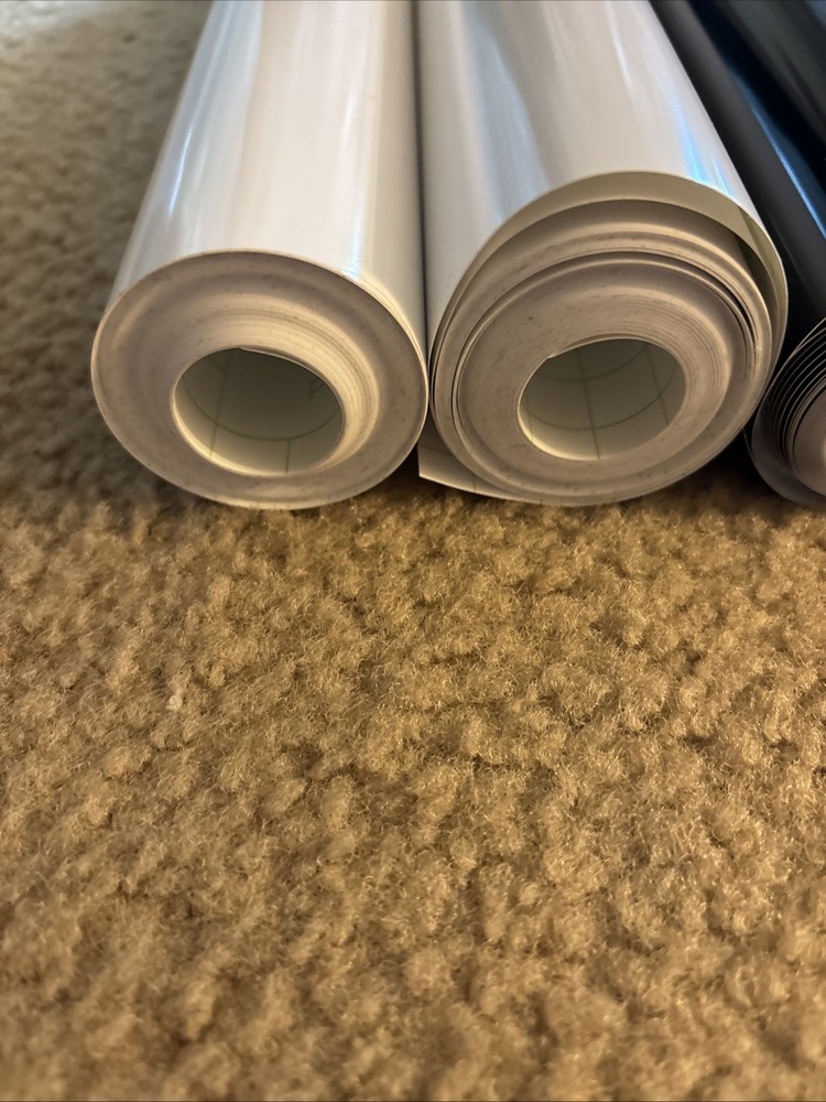 Cricut vinyl rolls- 2 White & 2 Black