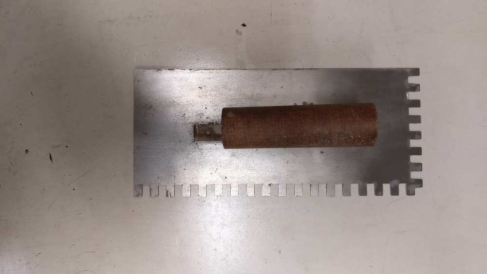 Eight assorted drywall/mud tools