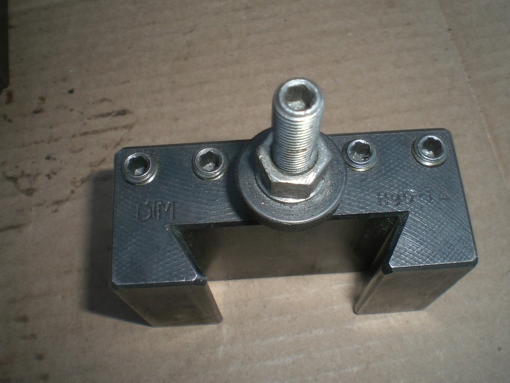 Genuine Aloris CXA tool post with 4 tool holders