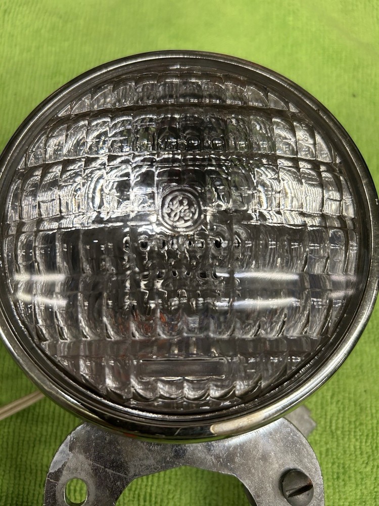 VINTAGE DELTA SEALED BEAM HEAD LIGHT AND HALF BATTERY BOX