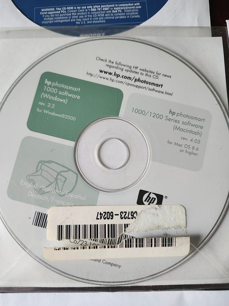 assorted computer installation and program discs