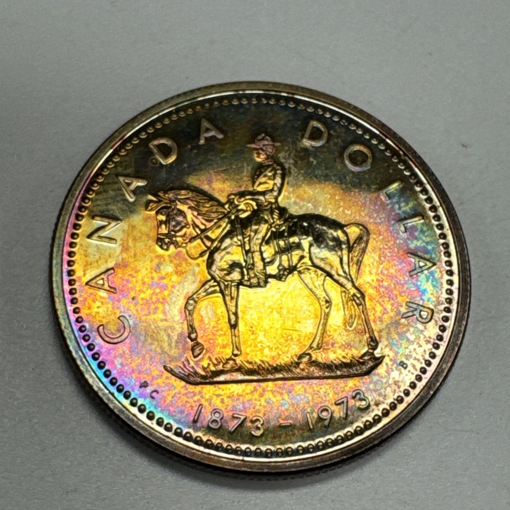 1973 Canada $1 Silver Dollar RCMP Rainbow Toning