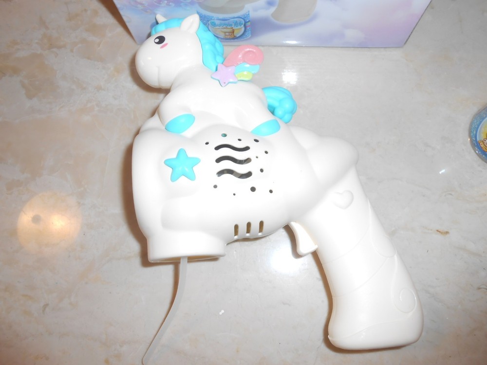 Blue Unicorn Bubble Gun Blower in box.