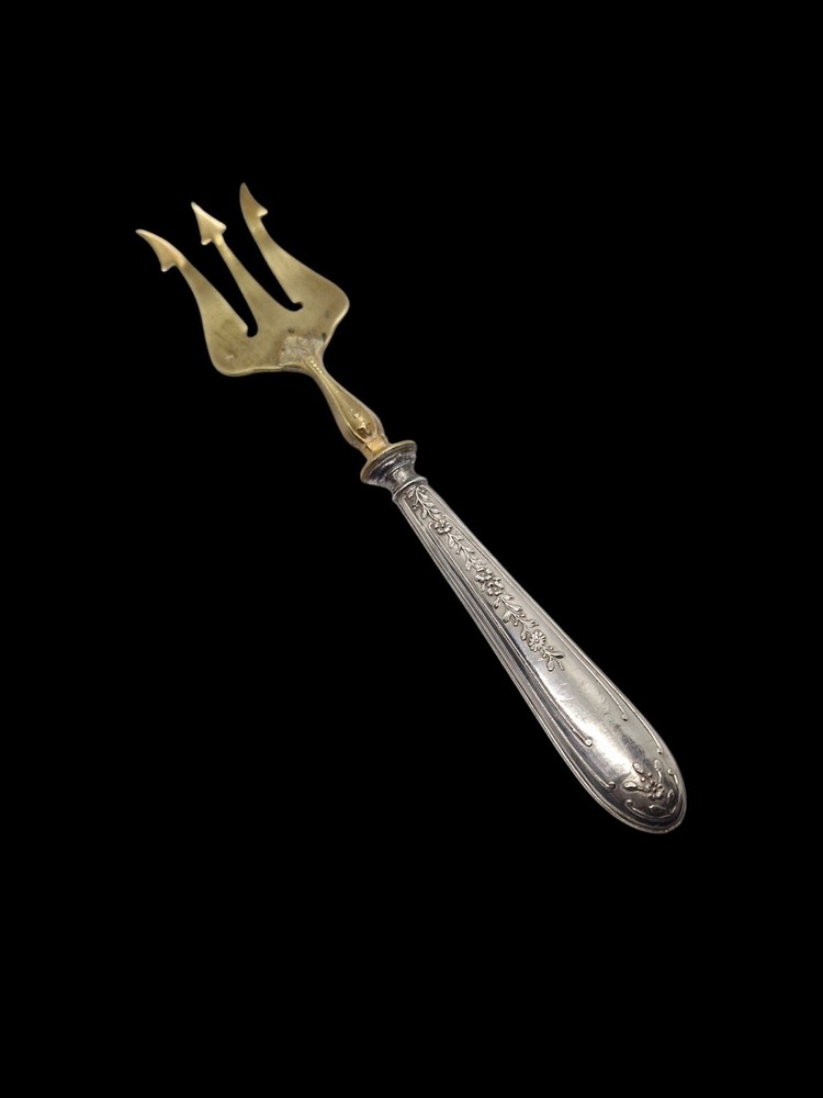 Vintage Antique brass fork with silver handle