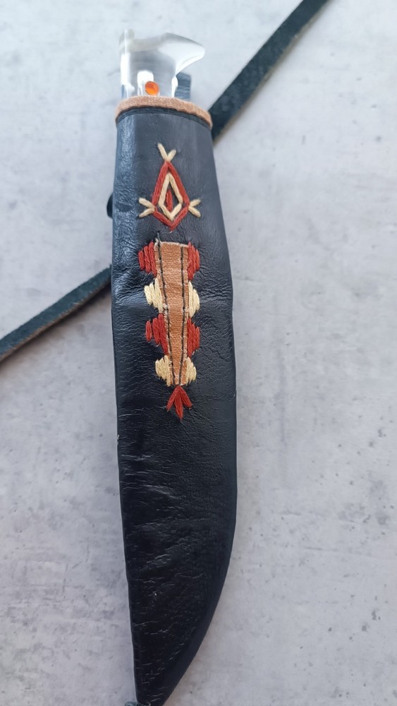 Vintage handmade knife with pattern.