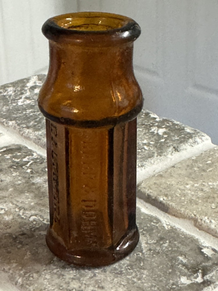 Vintage— Vivid Amber Sharp & Dohme Baltimore 29