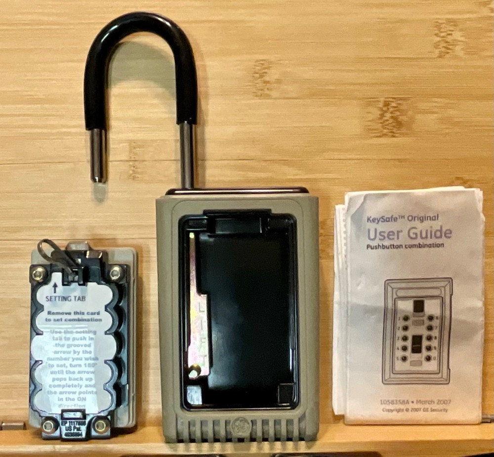 G.E. pushbutton Keysafe, new open box.