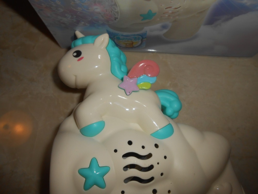 Blue Unicorn Bubble Gun Blower in box.