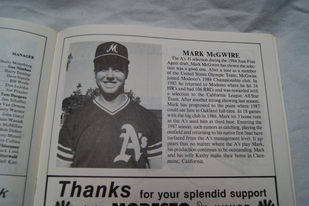 1987 modesto a's official souvenir program writing on cover