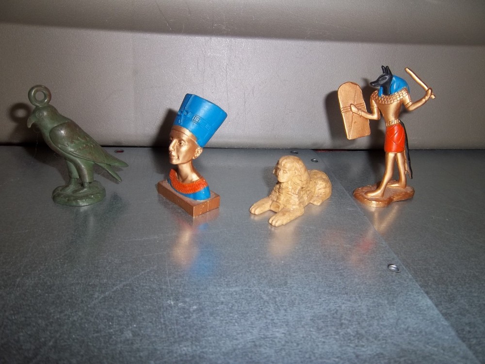 4 Multicolored Egyptian Figures: Horus, Nefertiti, Sphinx, & Ra