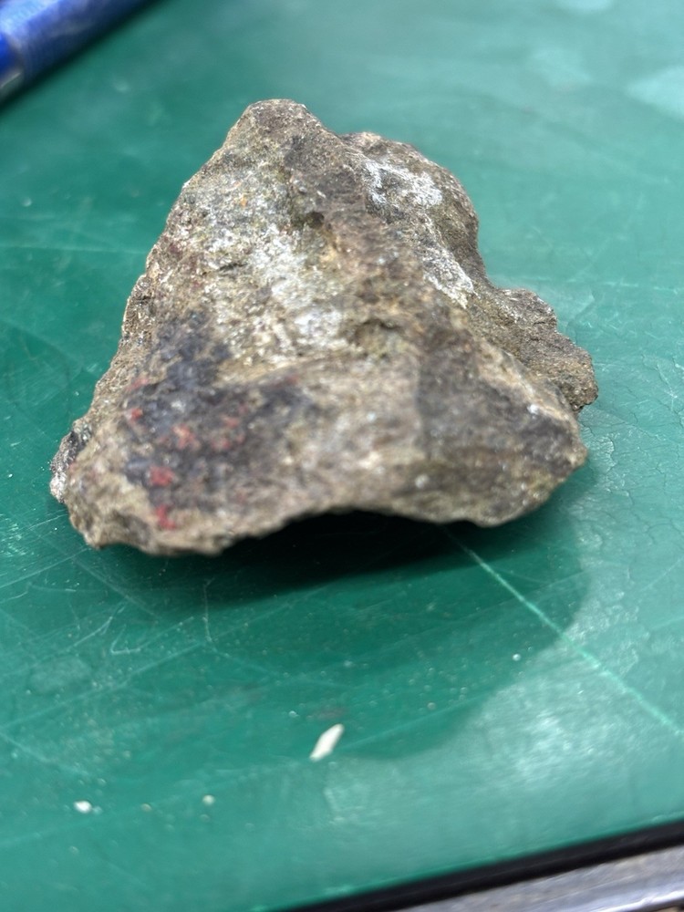 as gold ore on green stone
