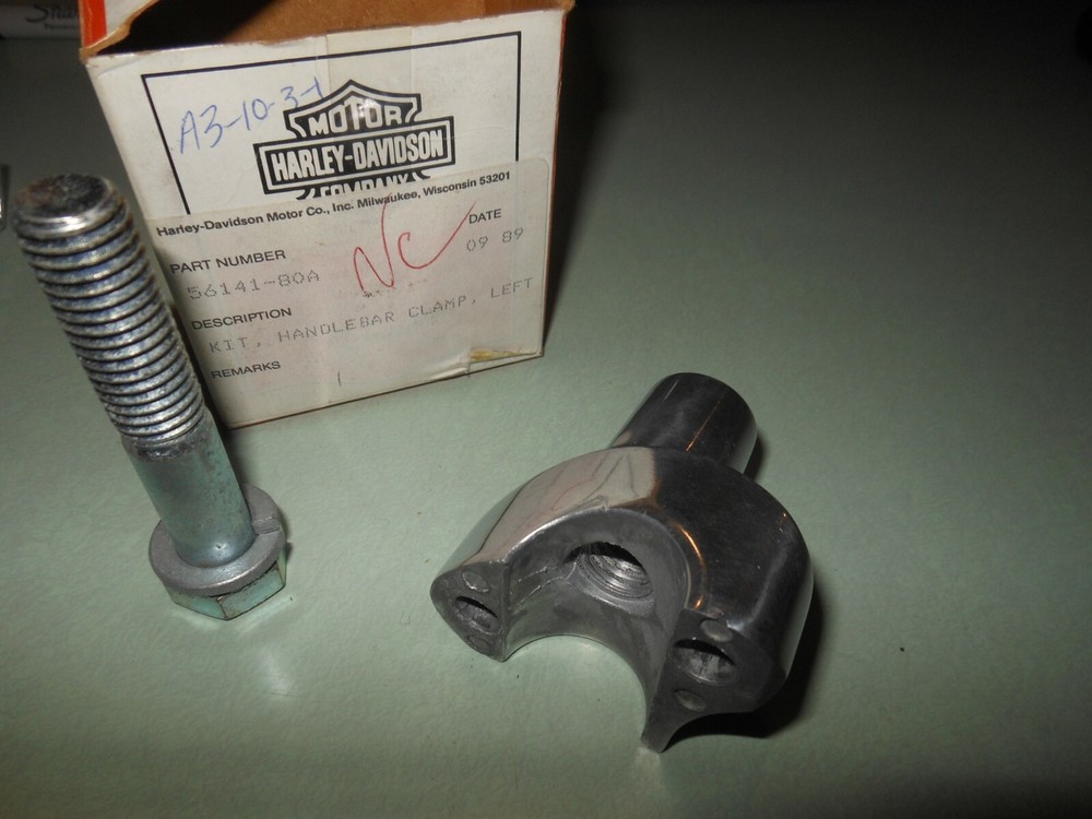 NOS OEM Harley Davidson Lower Handlebar Clamp + Bolt # 56141-80A