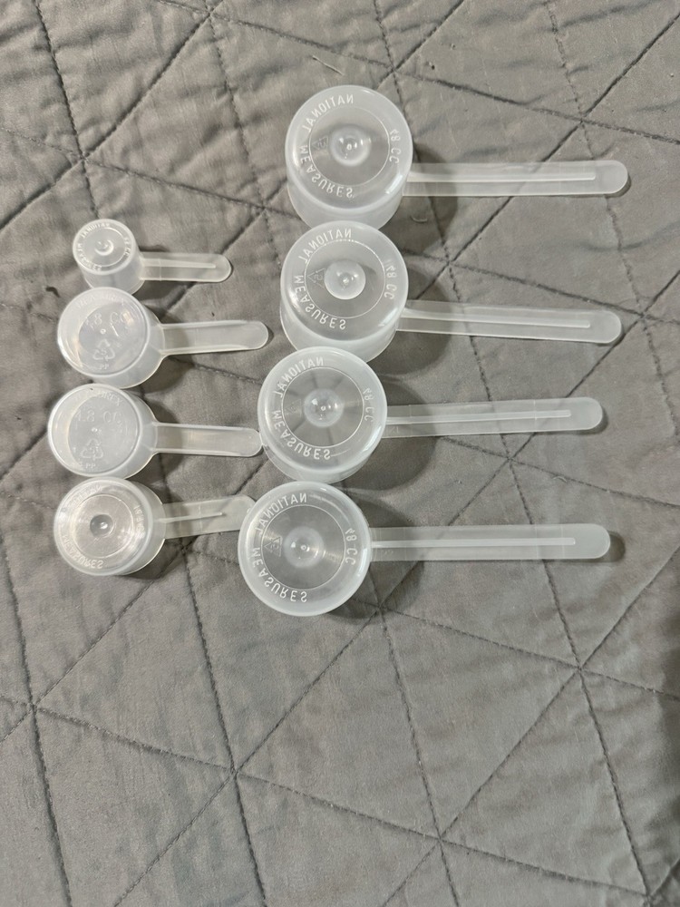 Plastic Measuring Scoops - 8 Total
