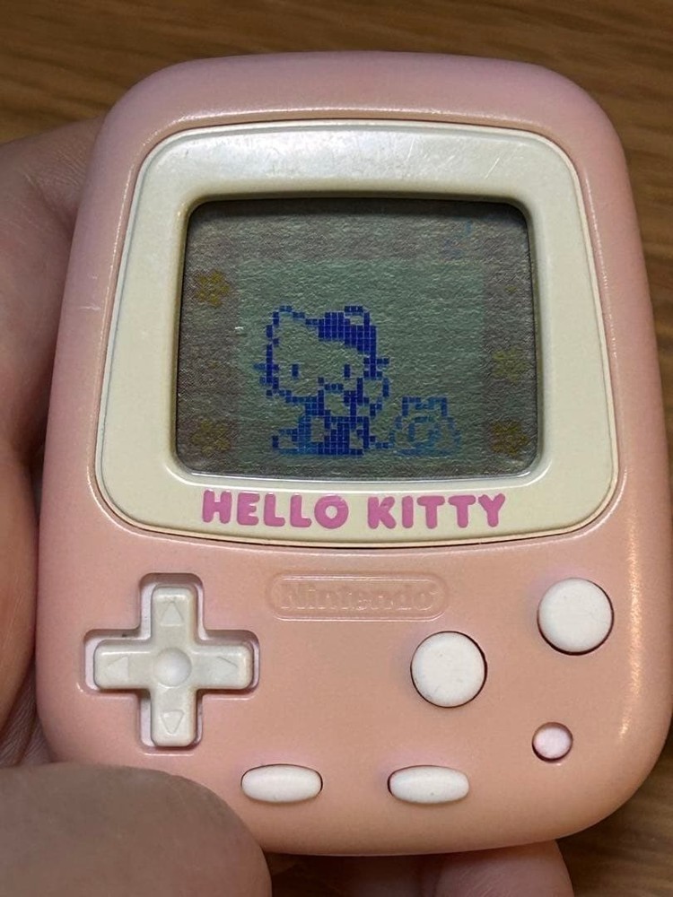 Used Hello Kitty Nintendo Pedometer Handheld Game Console Sanrio