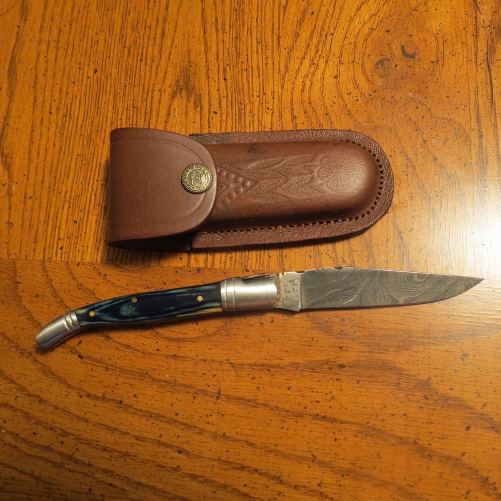 Damascus folding blade knife with blue laminate handle leather sheath hand made