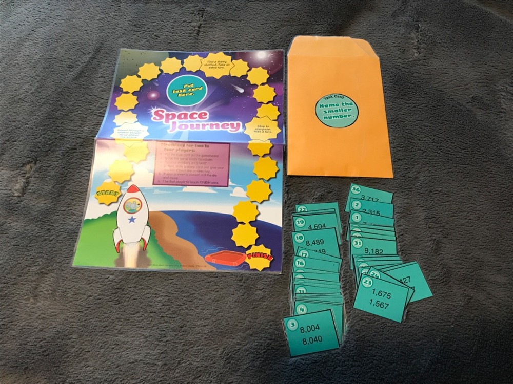 space Journey! Comparing numbers to 10,000 math file folder game grade 3
