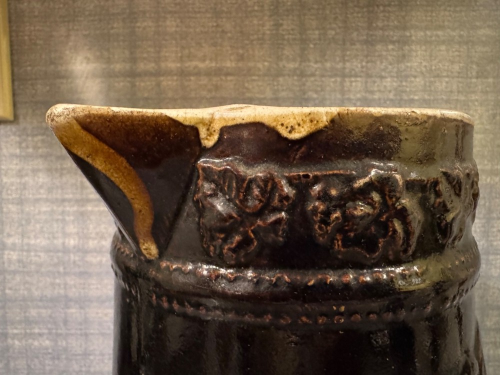 Antique Ceramic Pitcher with raised floral pattern