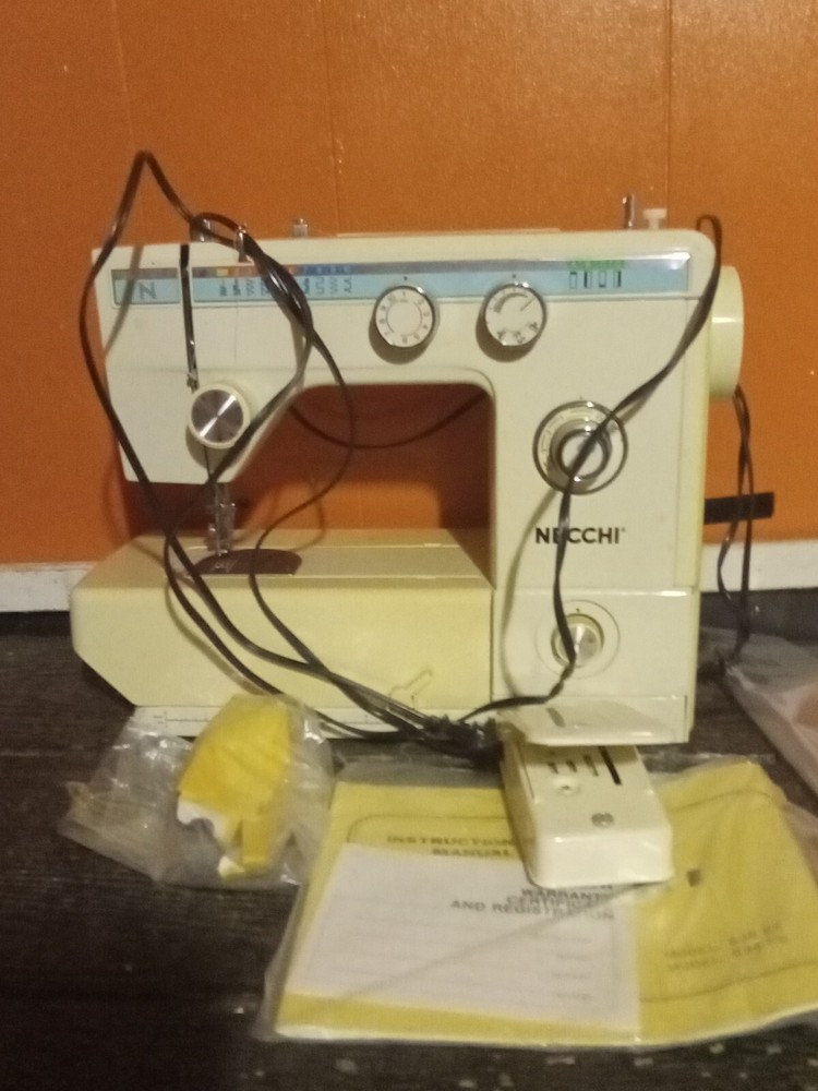Necchi Model 535FA Sewing Machine with box, petal, and accessories