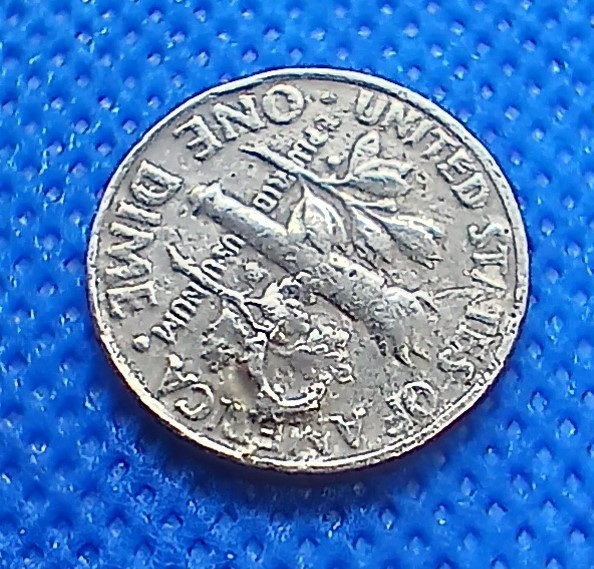 1 - 1986P Roosevelt Dime. Features various errors front and back.