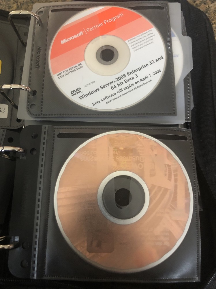 Microsoft Action Pack-Asst. Software 48 CDs- Many Keys Included