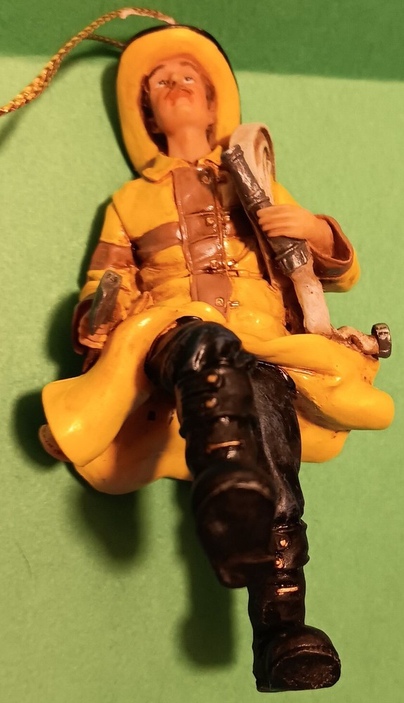 Firefighter w/ Hose Christmas Ornament