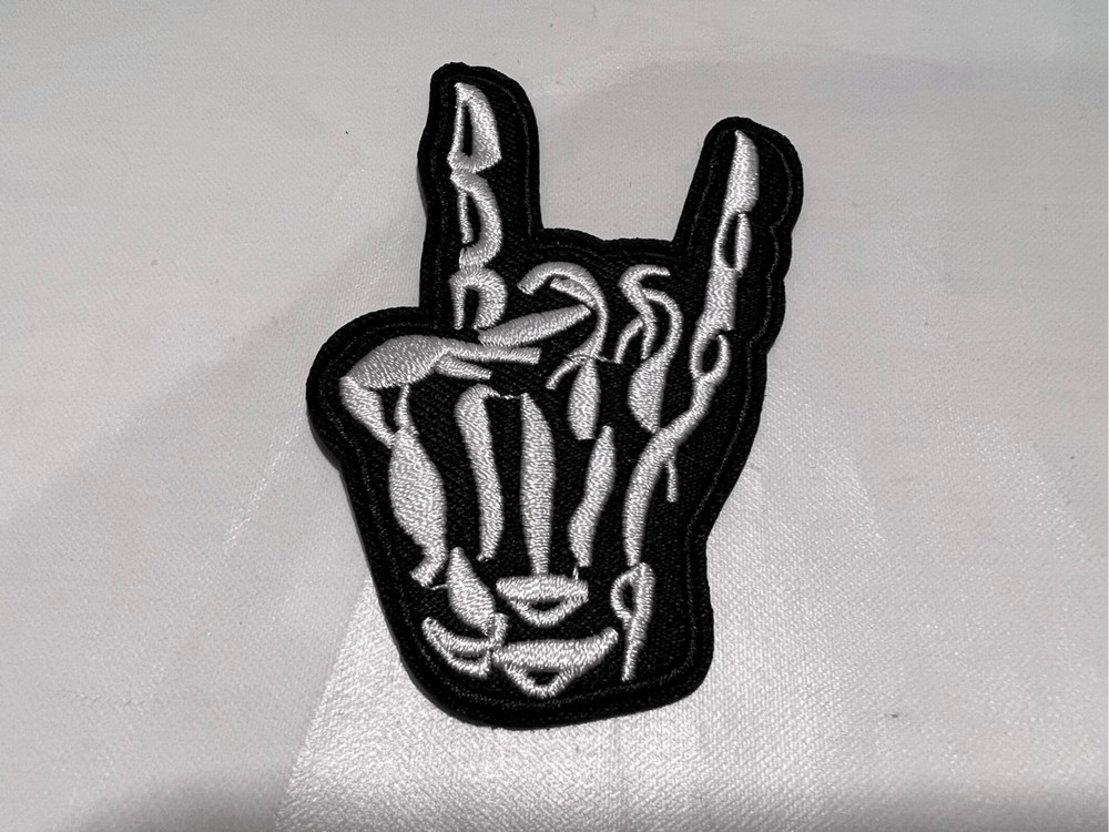 Skelton Hand Showing Horns Iron on Patch