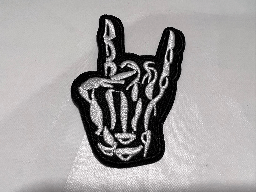 Skelton Hand Showing Horns Iron on Patch