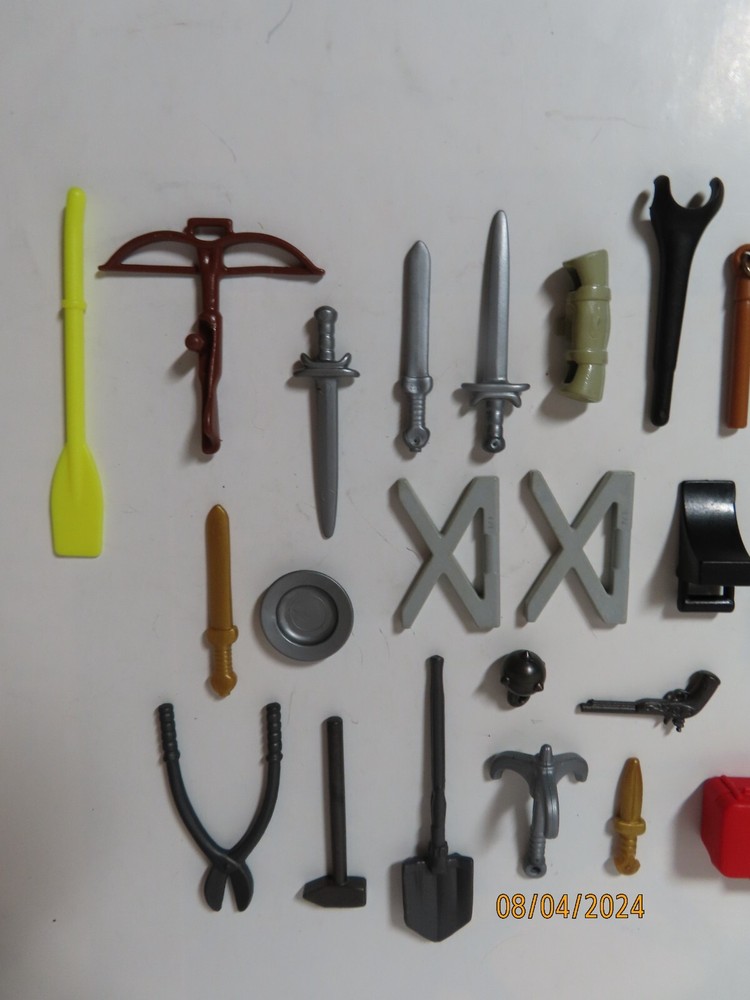 Action figure plastic weapons and accessories lot