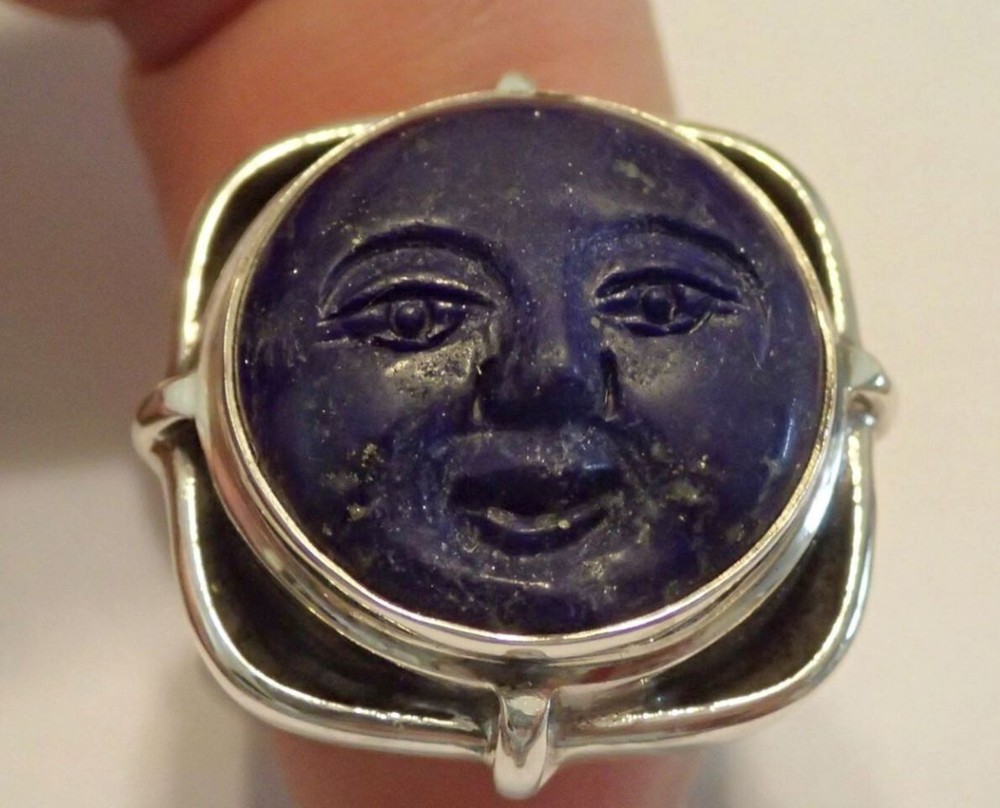 Sterling Silver Ring with Lapis carved Face. adjustable